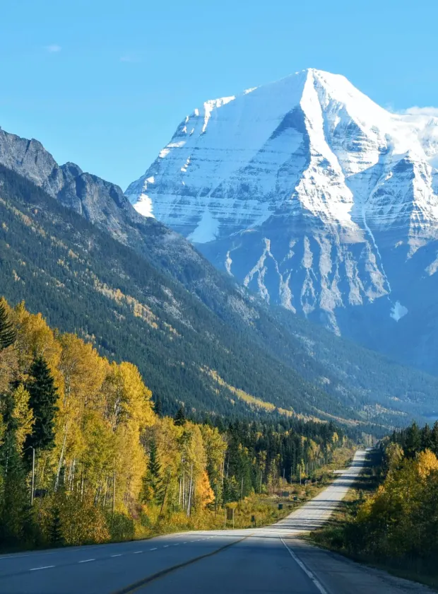 Winding mountain road disappearing into the distance